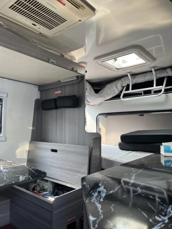 Off road camping trailer exterior with curved roof